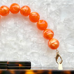 Beaded acrylic Purse Handle in Blaze orange_close up clasp