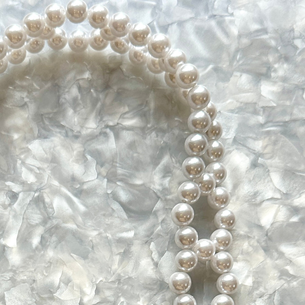 
                  
                    Pearl Purse Strap
                  
                