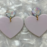 close up of Acrylic Heart Earrings in So In Love, purple and light blue 