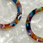 woman wearing  Acrylic Hoop Earrings in Multicolor 