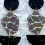 close up of Acrylic Pendulum Drop Earrings in Do Not Disturb, black and sliver