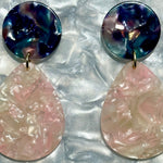 close up of Acrylic Teardrop Earrings in Sweet Tooth, pink, white, blue, and purple