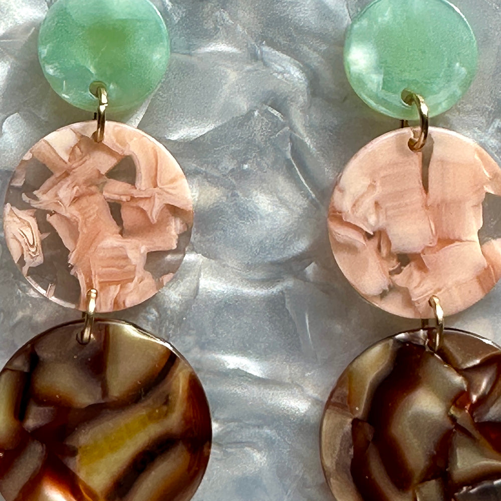 woman wearing a Acrylic dot drop earring in mint green, brown and pink 