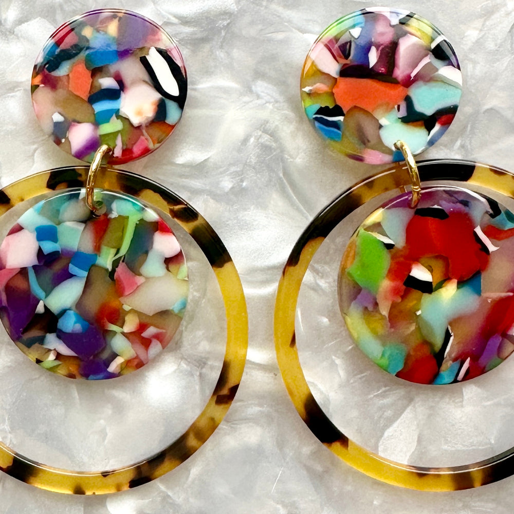 close up of Acrylic orbital drop earring in tortoise and multicolor 