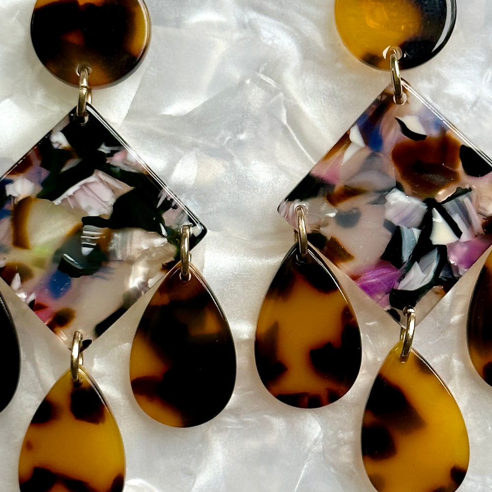 woman wearing acrylic Chandelier Drop Earrings in tortoise and multicolor