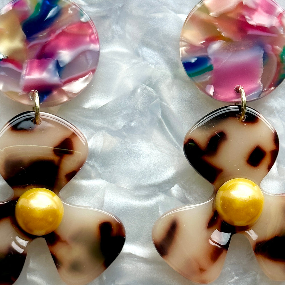 close up of acrylic Flower Drop Earrings in multicolor and blonde tortoise