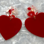 woman wearing acrylic Heart Earrings in Red Hot Love, white and red 