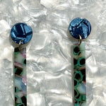 woman wearing acrylic Matchstick Drop Earrings in Lily Pond blue, green, pink