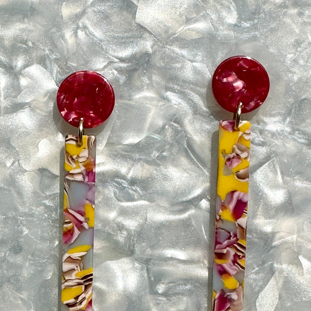 close up of acrylic Matchstick Drop Earrings in Magenta Me Crazy yellow, magenta and lilac