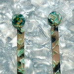 close up of acrylic Matchstick Drop Earrings in Mint To Be mint green and charcoal gray