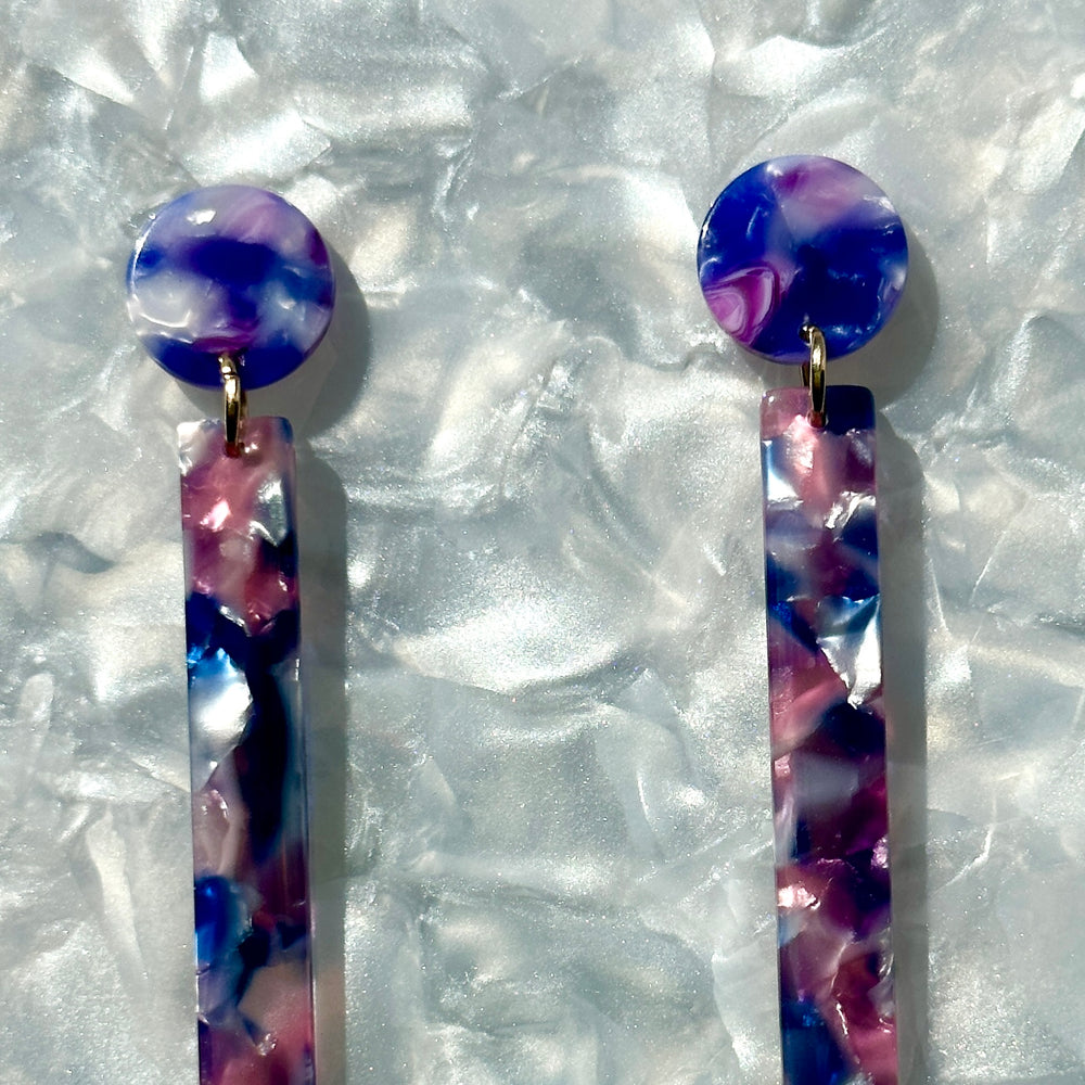 woman wearing acrylic Matchstick Drop Earrings in Purple