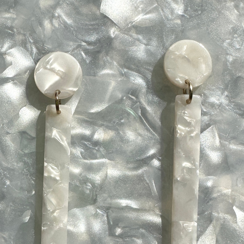 close up of acrylic Matchstick Drop Earrings in White