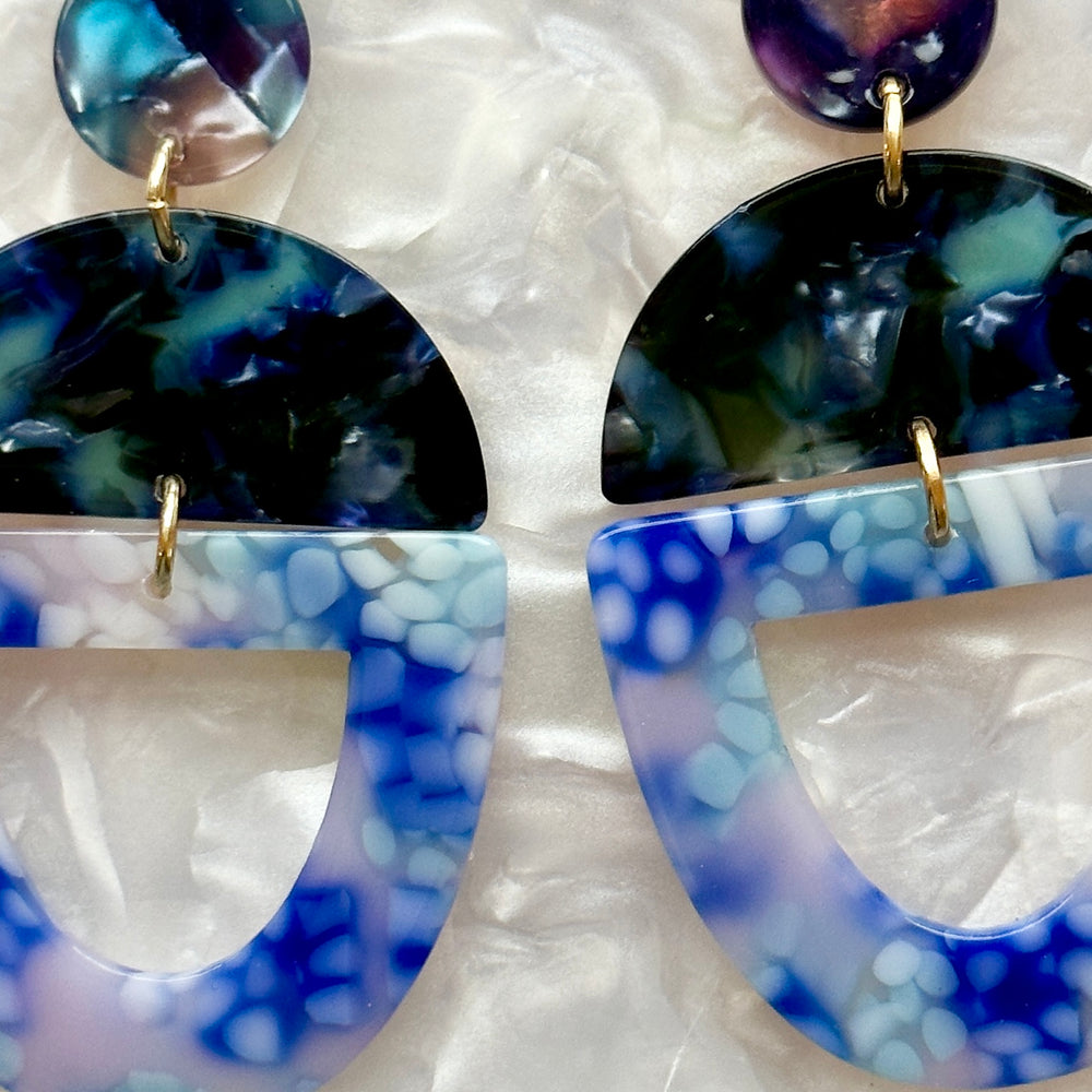 close up of acrylic Open Tab Drop Earrings in blue