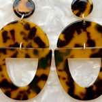 woman wearing acrylic Open Tab Drop Earrings in tortoise