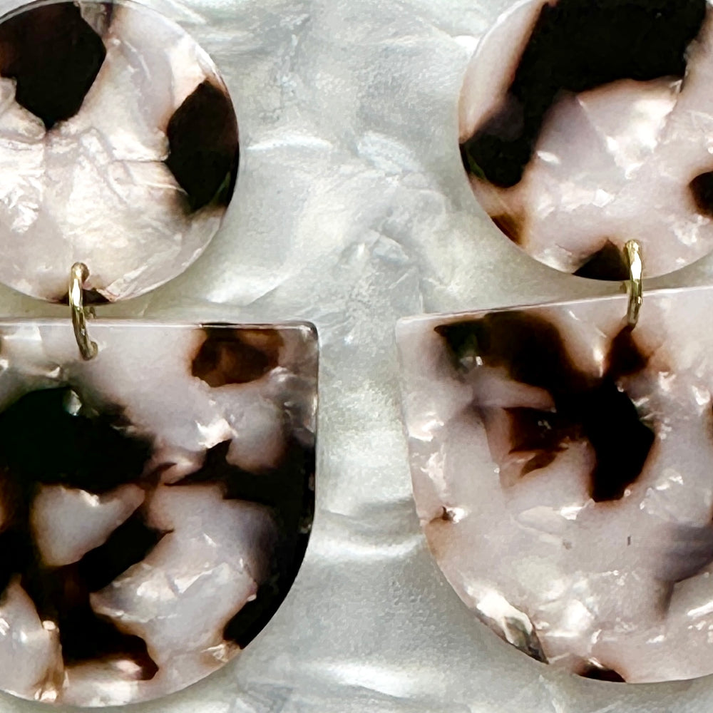 close up of acrylic Tab Drop Earrings in pearly tortoise