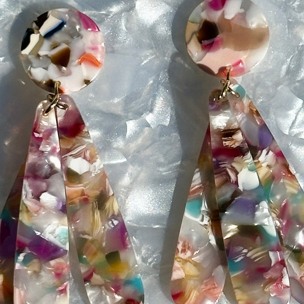 close up of acrylic flower Petal Drop Earrings in light multicolor