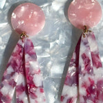 close up of acrylic flower Petal Drop Earrings in pink, purple and white