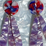 close up of acrylic flower Petal Drop Earrings in purple and red