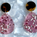 women wearing mini acrylic teardrop earring in pink and tortoise 