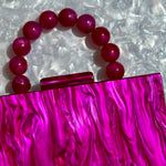 clutch purse with beaded handle in magenta pink acrylic_interior