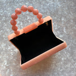 clutch purse with beaded handle in peach pink acrylic_interior