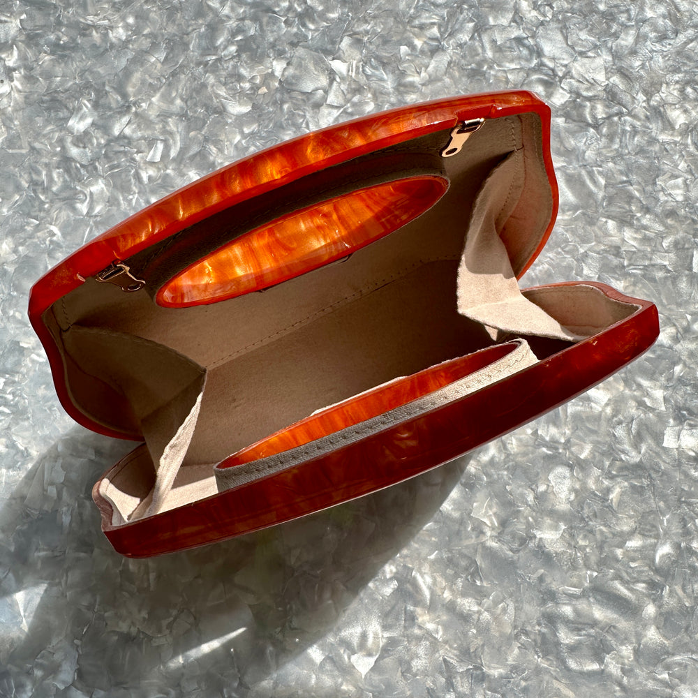 mod clutch purse in orange acrylic_interior