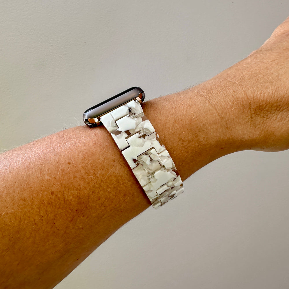 side view of woman wearing Apple Watch Band in Baby's Breath white and clear