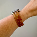 side view of woman wearing Apple Watch Band in Caramel brown