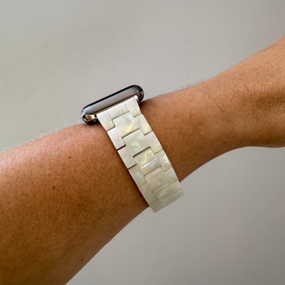 side view of woman wearing acrylic Apple Watch Band in Opal