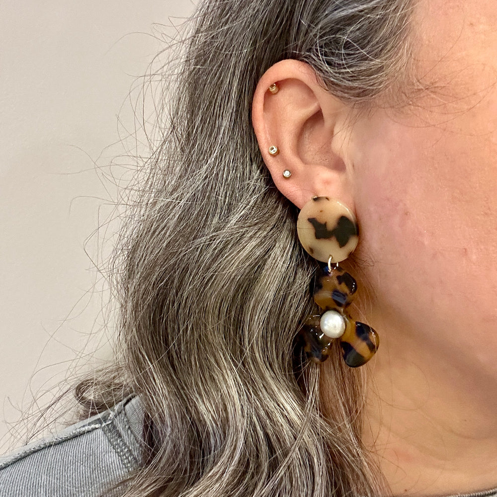 woman wearing Acrylic Flower Drop Earrings in Tortoise