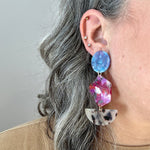 woman wearing  Acrylic Pendulum Drop Earrings in Berry In Love, blue, purple, red, beige, and Black 