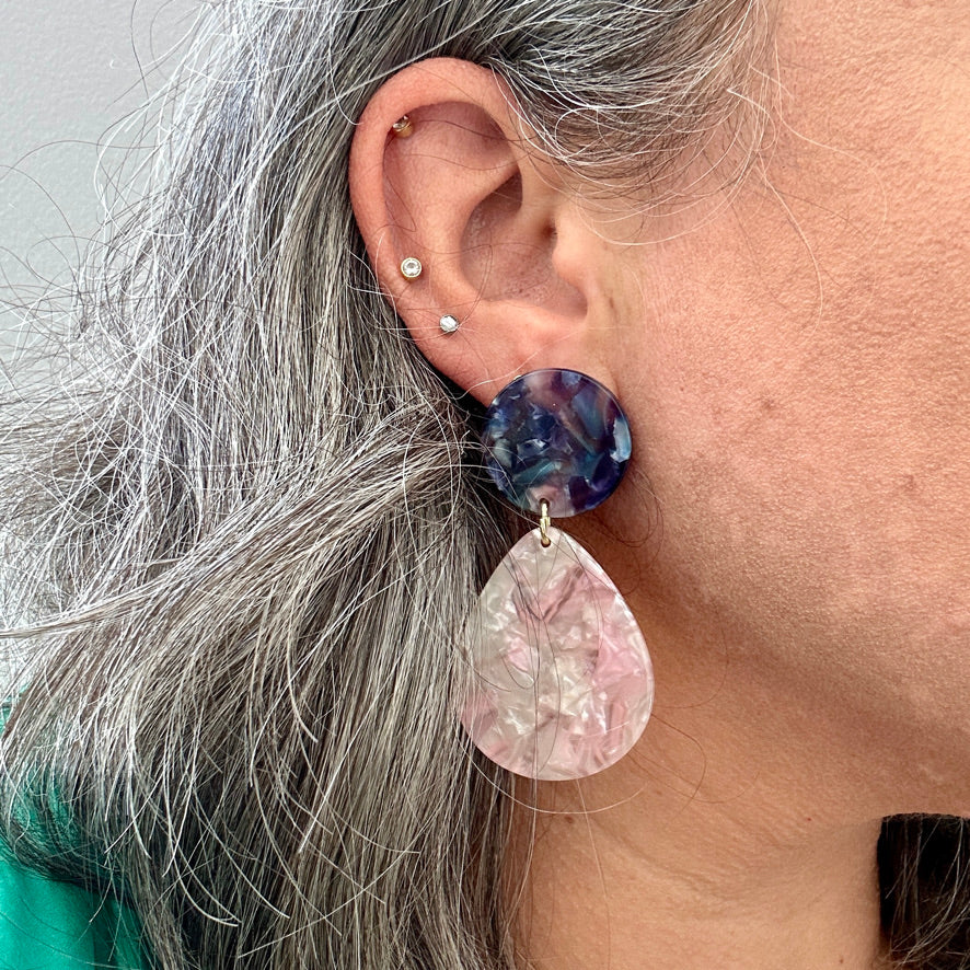 woman wearing Acrylic Teardrop Earrings in Sweet Tooth, pink, white, blue, and purple