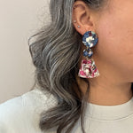 woman wearing a Acrylic Circle fan drop earring in blue and magenta pink mix