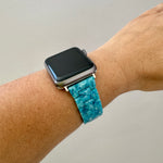 woman wearing acrylic Apple Watch Band in License to Thrill blue