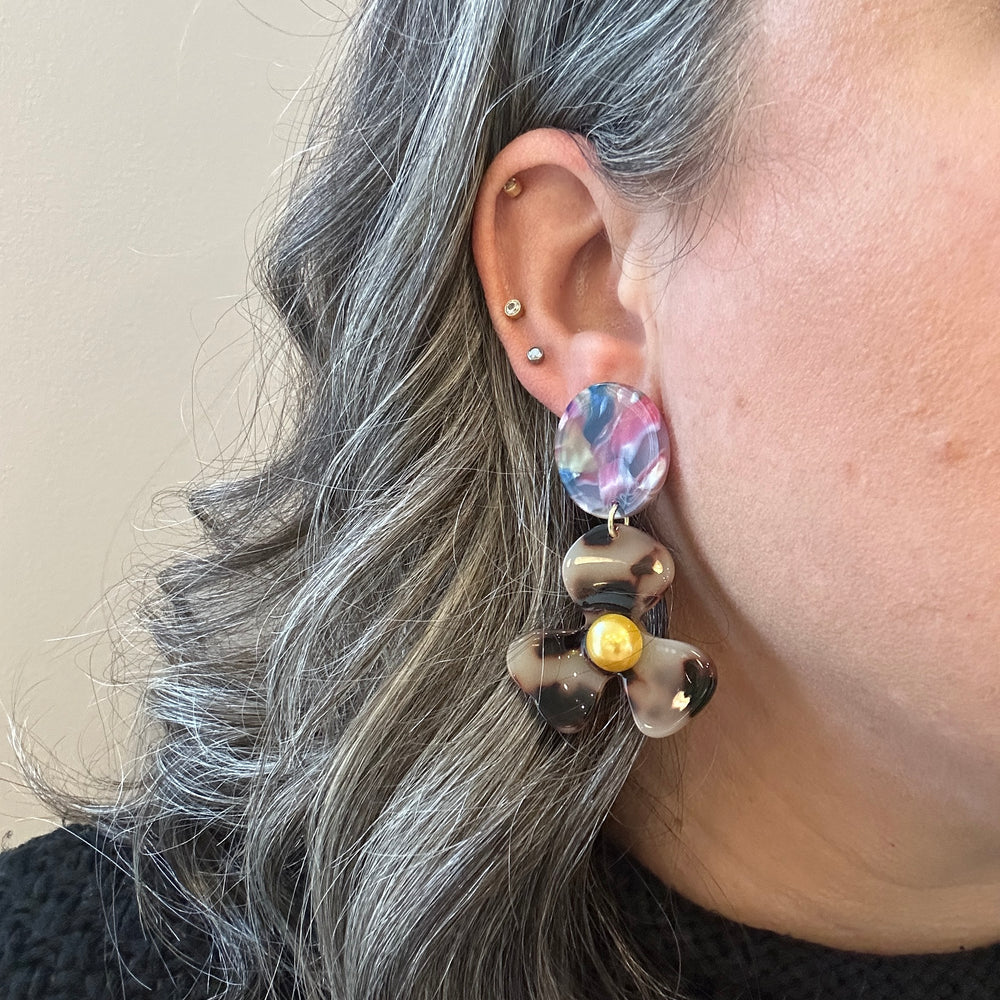 woman wearing acrylic Flower Drop Earrings in multicolor and blonde tortoise