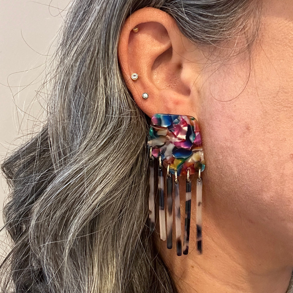 woman wearing acrylic Fringe Earrings in Rainbow Bright