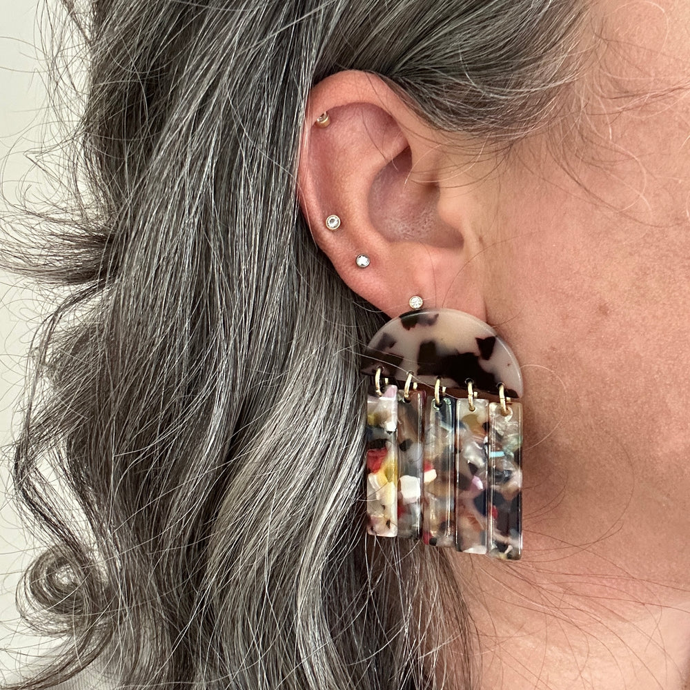 woman wearing acrylic Fringe Earrings in blonde tortoise and multicolor