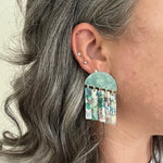 woman wearing acrylic Fringe Earrings in green, white, blue and pink