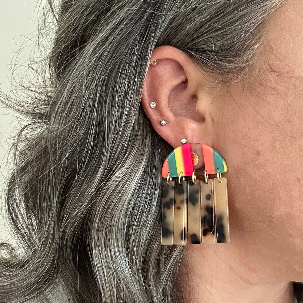 woman wearing acrylic Fringe Earrings in neon stripe and blonde tortoise