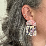 woman wearing acrylic Fringe Earrings in purple, pink and beige