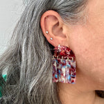 woman wearing acrylic Fringe Earrings in red, white and blue