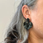 woman wearing acrylic Heart Earrings in Black