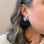 woman wearing acrylic Heart Earrings in Secret Admirer, black and light multicolor 