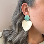 woman wearing acrylic Heart Earrings in Sweet Heart, cream and teal green 