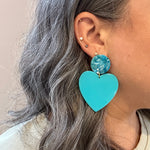 woman wearing acrylic Heart Earrings in Waterfalling in Love and Blue 