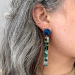 woman wearing acrylic Matchstick Drop Earrings in Lily Pond blue, green, pink