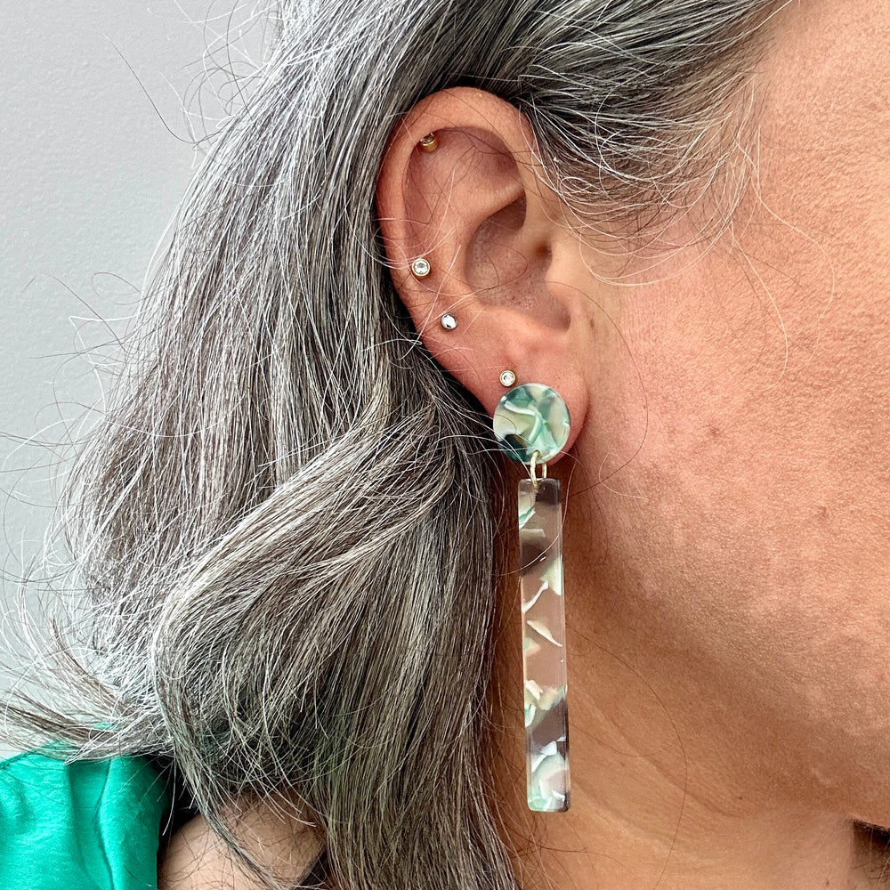 woman wearing acrylic Matchstick Drop Earrings in Mint To Be mint green and charcoal gray