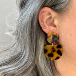 woman wearing acrylic Tab Drop Earrings in Tortoise