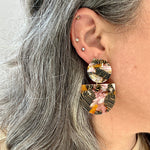 woman wearing acrylic Tab Drop Earrings in pink, orange and black