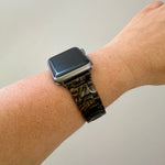 woman wearing acrylic watch band in brown